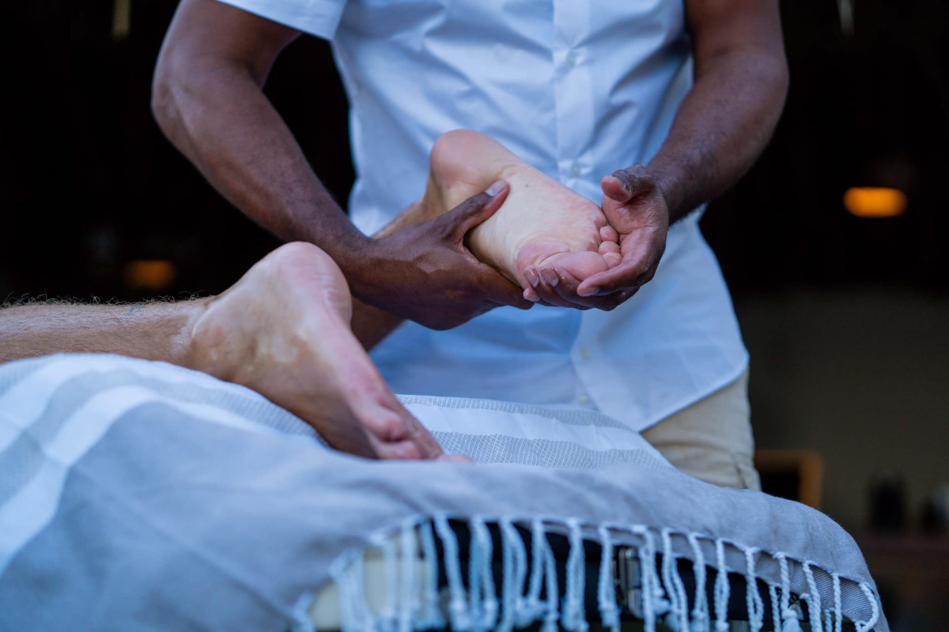 A foot massage on a massage table
